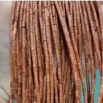 No_1165_Synthetic Goldstone Round Tube_2*4mm_(Sold Per Strand)