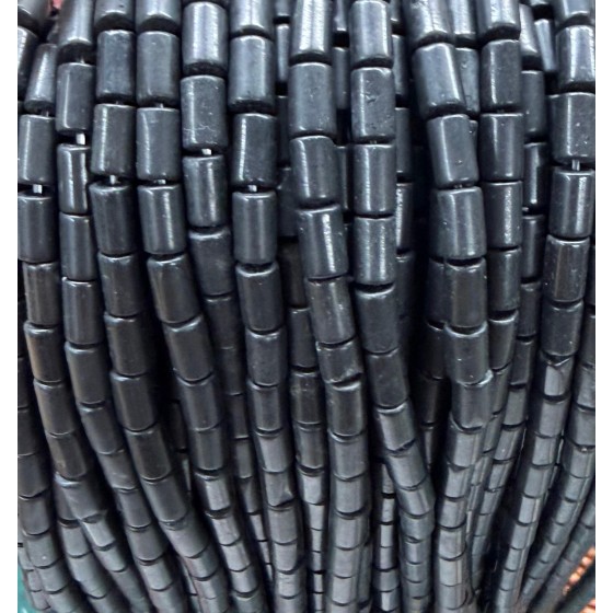 No_2643_Natural Black Stone Cylinder_5*8mm_(Sold Per Strand)
