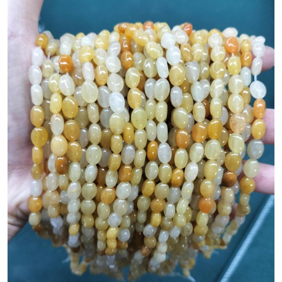 No_310_Yellow Jade Egg Shaped Bead_6*8mm_(Sold Per Strand)