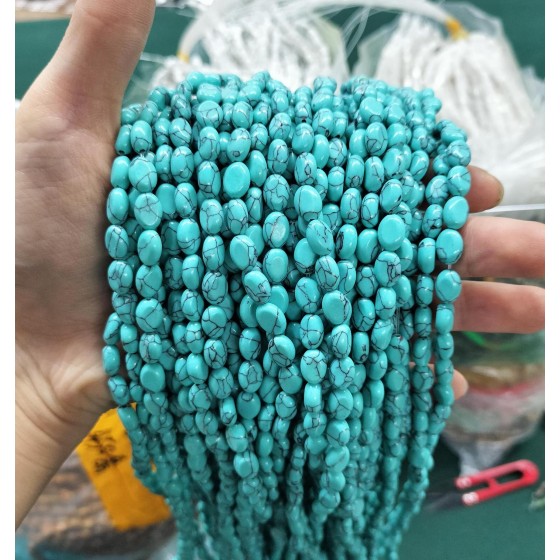 No_314_Synthetic Light Turquoise Egg Shaped Bead_6*8mm_(Sold Per Strand)