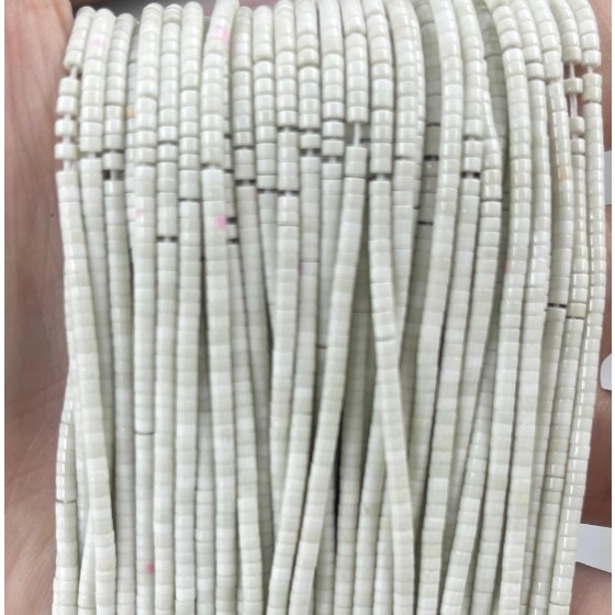 No_524_Natural Magnesite Small Cylinder_2*2mm_(Sold Per Strand)