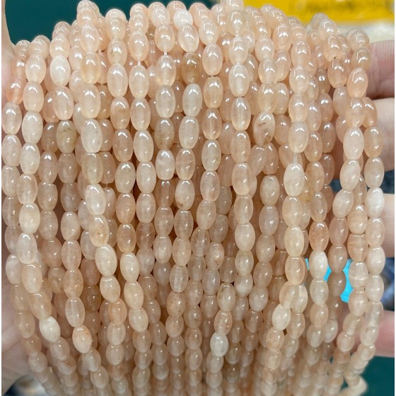No_581_Enhanced Light Orange Chalcedony Rice Beads_4*6mm_(Sold Per Strand)
