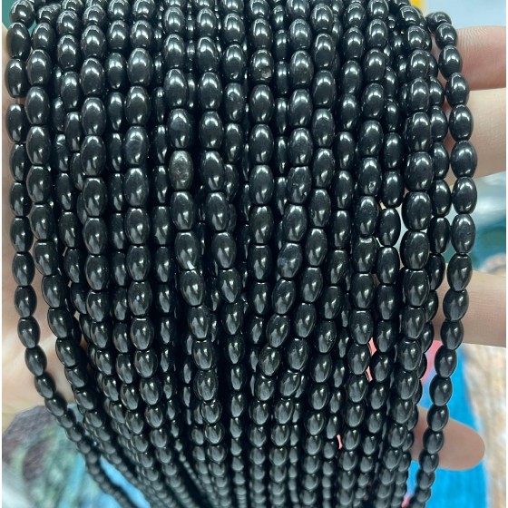 No_595_Synthetic Black Stone Beads_4*6mm_(Sold Per Strand)