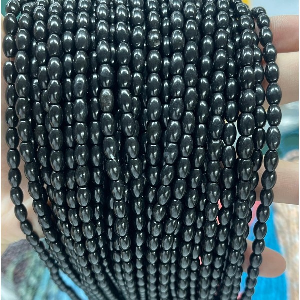 No_595_Synthetic Black Stone Beads_4*6mm_(Sold Per Strand)
