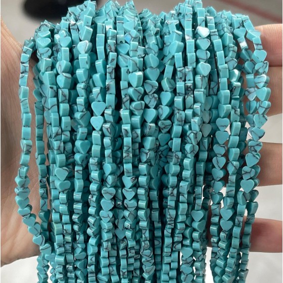 No_655_Synthetic Light Green Turquoise Flat Heart_4mm_(Sold Per Strand)