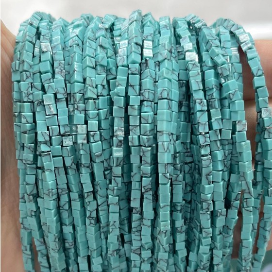 No_811_Synthetic Light Turquoise Small Cubes_2mm_(Sold Per Strand)