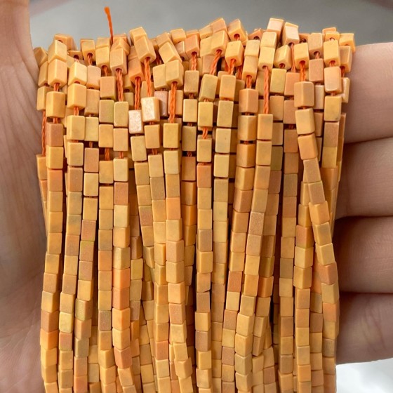 No_943_Synthetic Orange Stone Small Rectangle_2*4mm_(Sold Per Strand)